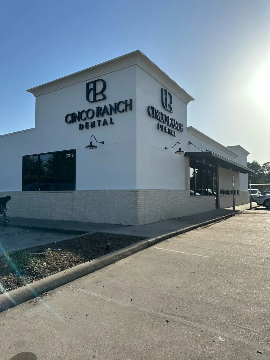 Dimensional storefront signs for Cinco Ranch Dental on a modern commercial building in Katy, Texas